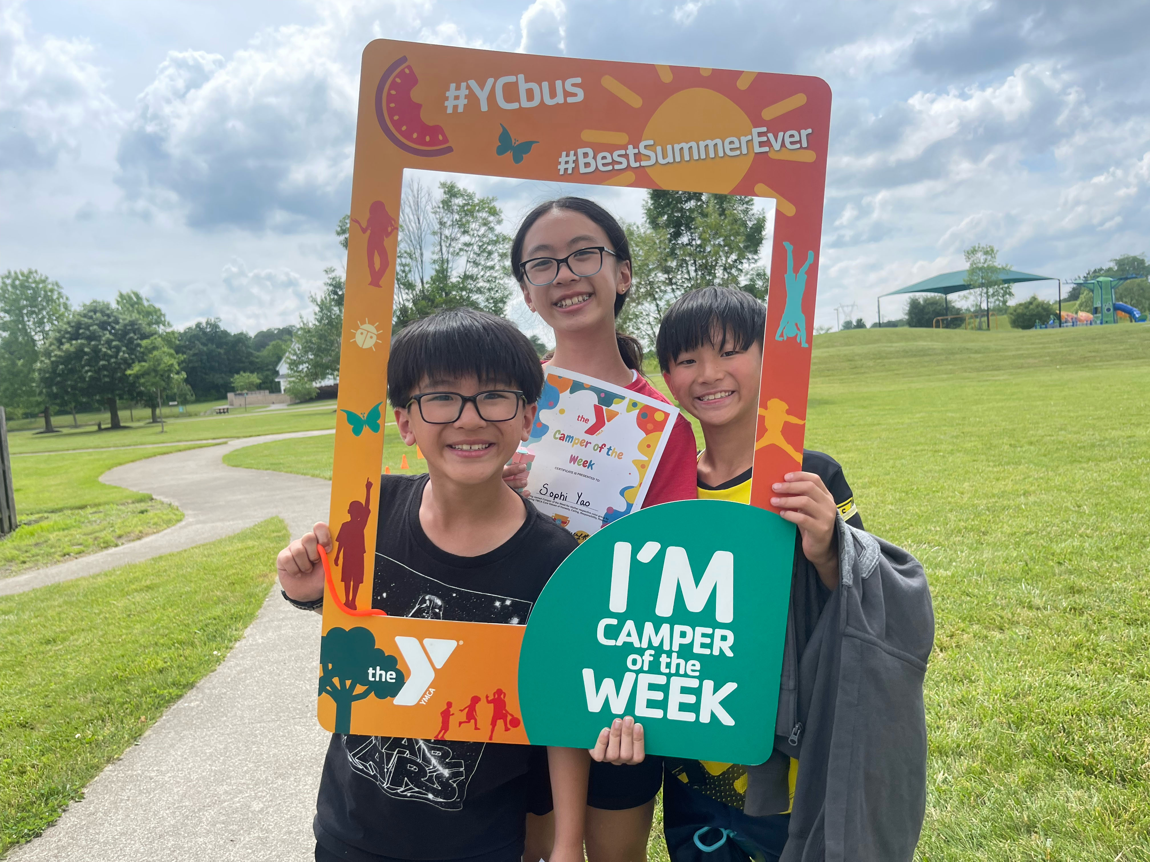 A group of youth enjoying the outside area at the Grove City YMCA