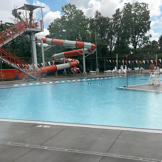 Outdoor pool with slide