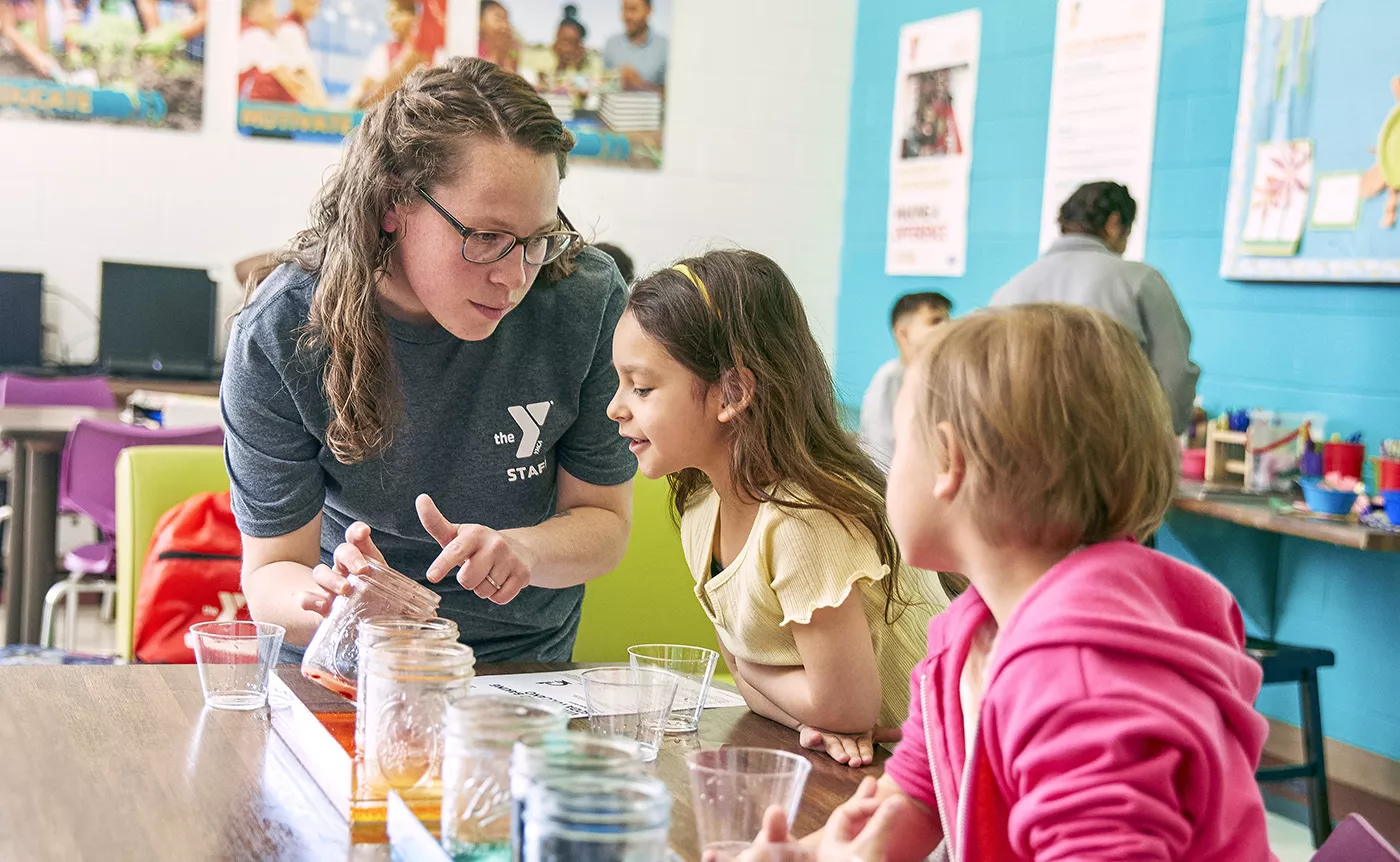 YMCA staff and kids in child care program