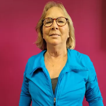 Woman standing and smiling