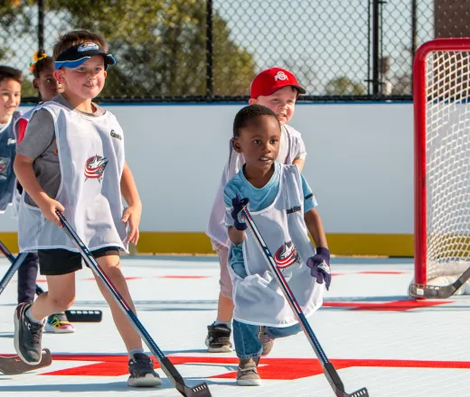 kids play hockey at free Get Out And Learn clinic with Blue Jackets
