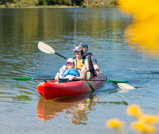 Family kayaks at 2025 Outdoor Inclusive Adventures event