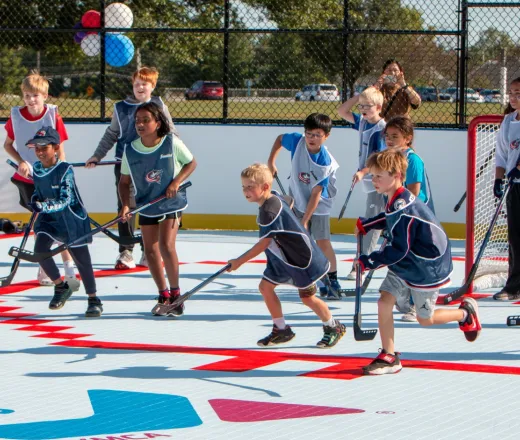 young athletes participate in hockey clinic with CBJ on brand new Liberty Township/Powell YMCA outdoor street hockey rink